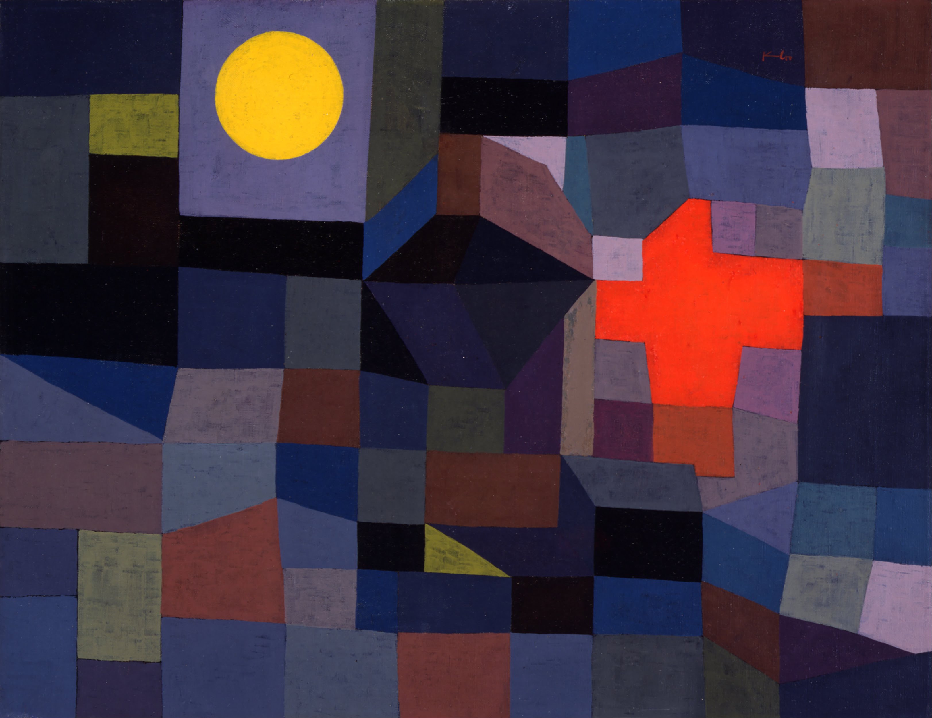 Fire at Full Moon, a 1933 painting by Paul Klee: a patchwork of dark angular blocks — blues, violets, blacks, muted browns — under a night sky. a full yellow moon glows at the upper left, and a jagged bright-red fire blazes at the right.